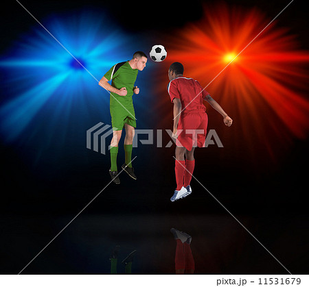 Football players tackling for the ball Football players tackling for the ball 11531679