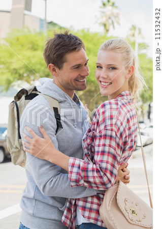 Young tourist couple hugging each other 11532432
