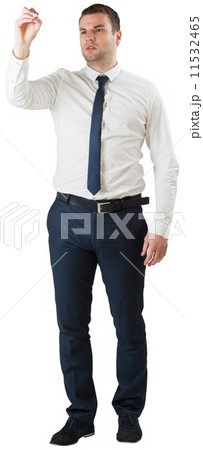 Young businessman writing with marker 11532465