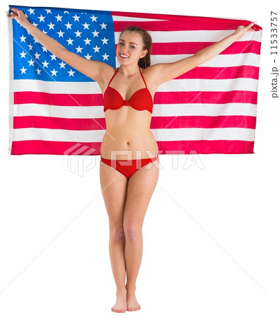Pretty girl in bikini with american flag Pretty girl in bikini with american flag 11533757