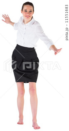 Businesswoman performing a balancing act 11551683