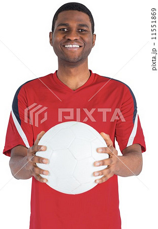 Handsome football fan looking at camera Handsome football fan looking at camera 11551869