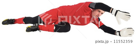 Fit goal keeper jumping up 11552359
