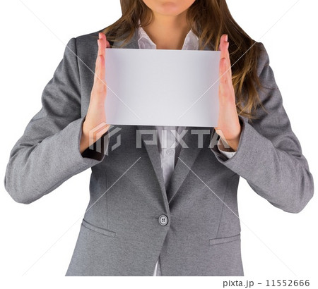 Businesswoman showing a blank card Businesswoman showing a blank card 11552666
