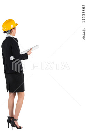 Smiling architect in black suit holding blueprint Smiling architect in black suit holding blueprint 11553362