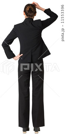 Businesswoman standing and thinking 11553396
