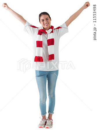 Excited asian football fan cheering Excited asian football fan cheering 11553498