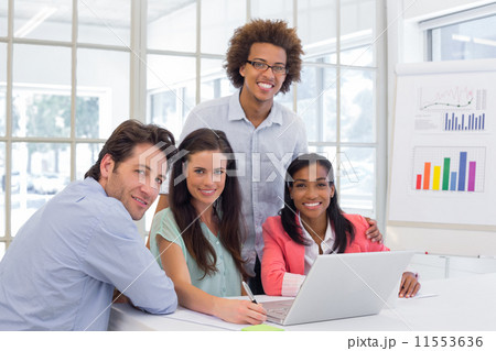 Casual business team having a meeting Casual business team having a meeting 11553636