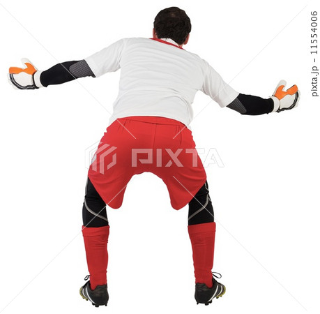 Goalkeeper with arms ready to catch Goalkeeper with arms ready to catch 11554006