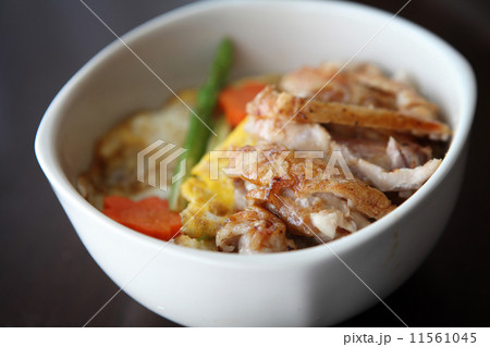 Grilled Chicken teriyaki rice on wood background Grilled Chicken teriyaki rice on wood background 11561045