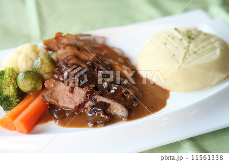 Duck confit , Roasted duck with blueberry sauce 11561338