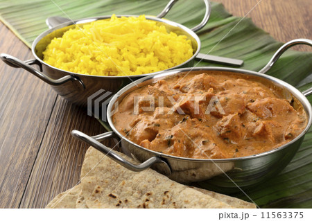 Butter Chicken & Lemon Rice - Indian curry on a banana leaf 11563375