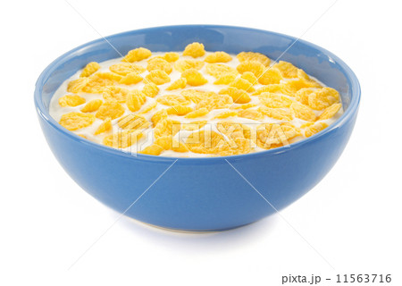 corn flakes and milk in bowl on white corn flakes and milk in bowl on white 11563716