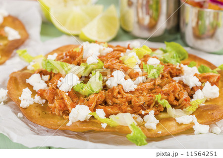 Tostadas - Mexican crispy tortilla with chicken tinga and cotija  11564251