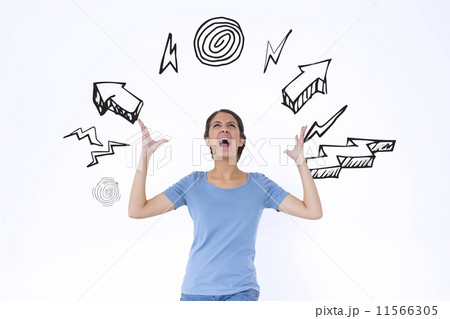 Effort against yellow paper strewn over notepad Effort against yellow paper strewn over notepad 11566305