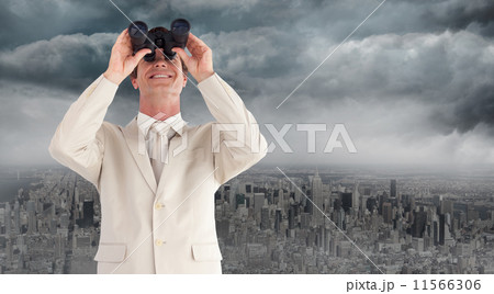 Composite image of businesswoman performing a balancing act 11566306