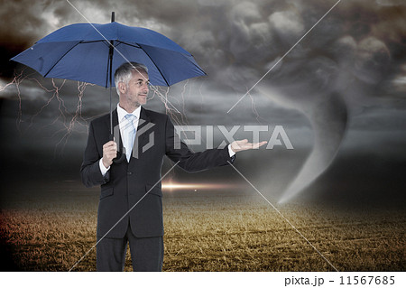 Composite image of anxious brown haired model posing holding her 11567685