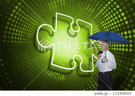 Composite image of businessman standing on ladder 11569003