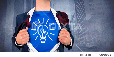 Composite image of smiling businessman in a hurry 11569053