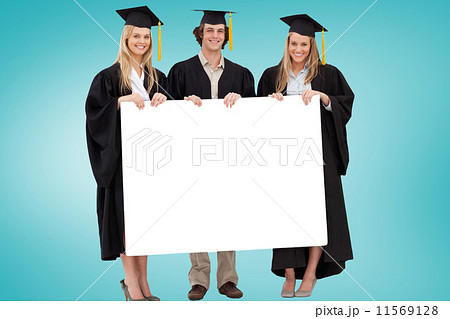 Composite image of businessman standing on ladder 11569128