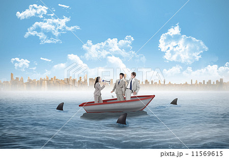 Composite image of businesswoman holding tablet and looking up 11569615