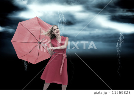 Composite image of businessman opening his shirt superhero style 11569823