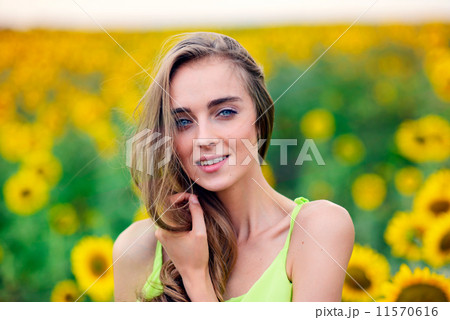 Woman with sunflowers 11570616