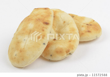 Naan bread on a white background. 11572588