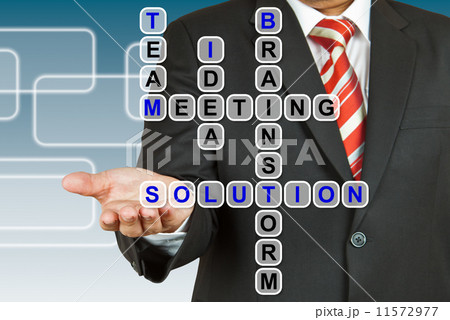 Businessman with wording Solution from working together Businessman with wording Solution from working together 11572977