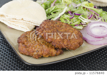 Shami Kebab - Spicy lamb patties, salad, pitta & red onions Shami Kebab - Spicy lamb patties, salad, pitta & red onions 11576840