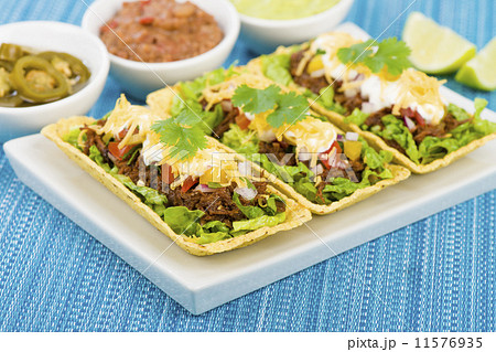 Shredded beef taco trays with salsa, sour cream and cheese  11576935
