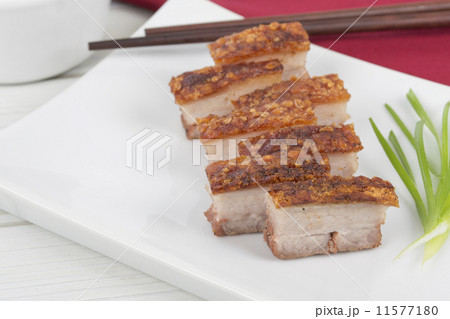 Siu Yuk - Chinese crispy roasted pork belly on a white platter.  11577180