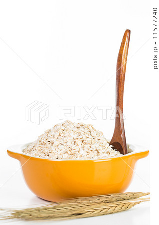 Oat flakes pile Oat flakes pile 11577240