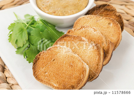 Thai toast and peanut sauce. Traditional sides for satay.  11578666
