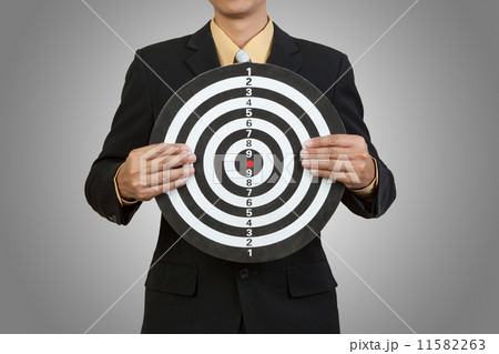 Businessman hold the target Businessman hold the target 11582263