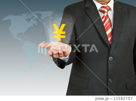 Businessman with Yen symbol over his hand Businessman with Yen symbol over his hand 11582757