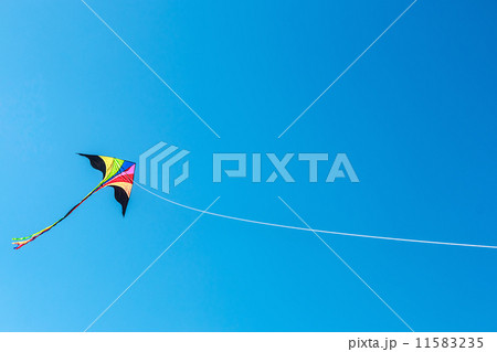 kite with tail in clear blue sky kite with tail in clear blue sky 11583235