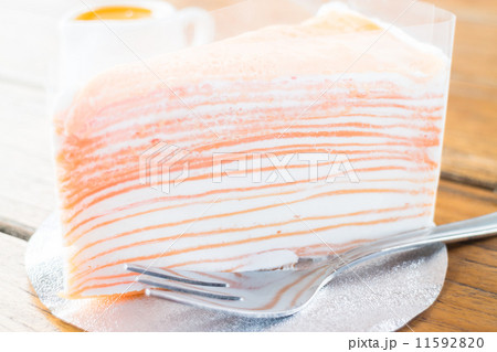 Delicious homemade crepe cake with orange sauce Delicious homemade crepe cake with orange sauce 11592820