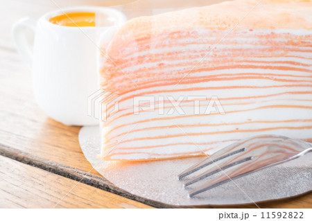 Close up crepe cake with orange sauce Close up crepe cake with orange sauce 11592822