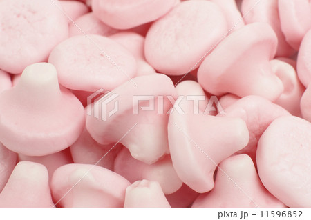 Strawberry Mushrooms - Mushroom shaped strawberry flavour sweets close up. Strawberry Mushrooms - Mushroom shaped strawberry flavour sweets close up. 11596852