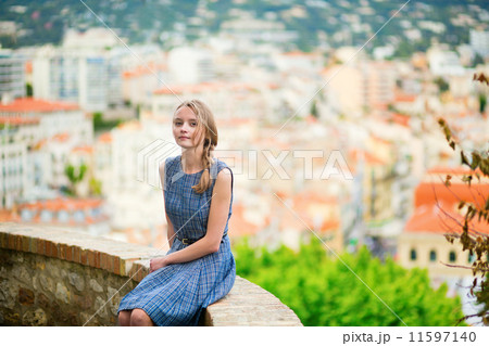 Elegant young woman in the Old town of Cannes 11597140