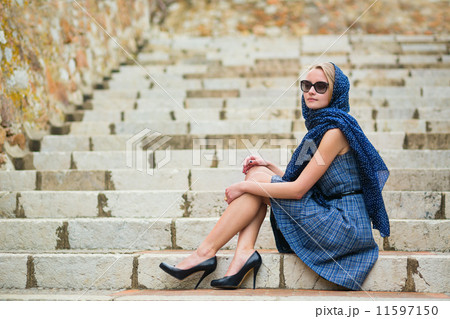 Elegant young woman in the Old town of Cannes 11597150