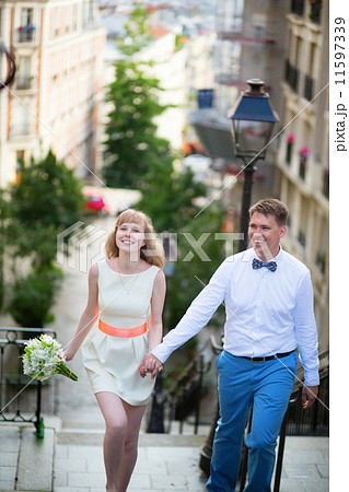 Happy young newly-wed couple on Montmartre 11597339