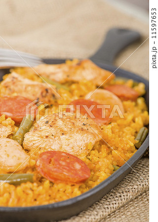 Paella Valenciana - Paella with chicken, sausage and vegetables  11597653