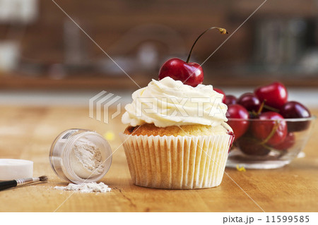 Cupcake with Cherries and icing glitter 11599585