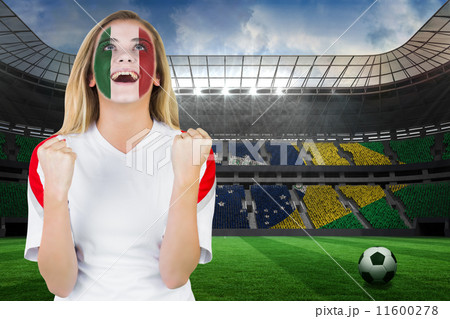 Composite image of excited italy fan in face paint cheering 11600278