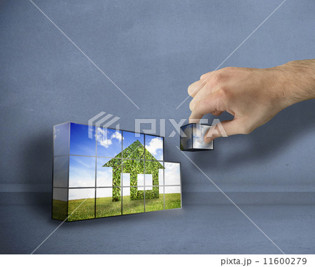 Composite image of hand building wall 11600279