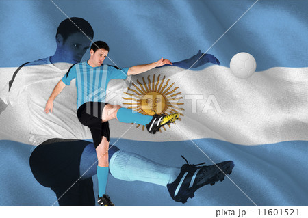 Composite image of football player in blue kicking Composite image of football player in blue kicking 11601521