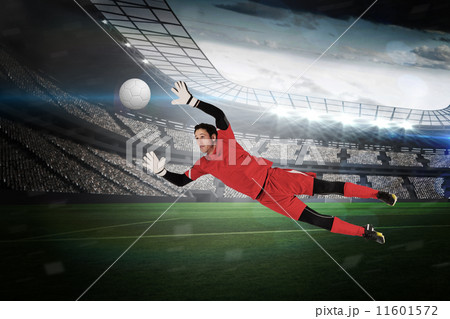 Composite image of fit goal keeper jumping up Composite image of fit goal keeper jumping up 11601572