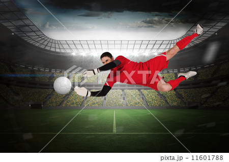 Composite image of fit goal keeper jumping up Composite image of fit goal keeper jumping up 11601788